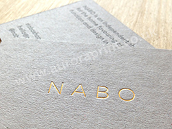 Gold foil business cards - Grey board business cards printed with dark grey and metallic gold foils.