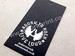 black card swing tag with white foil print.