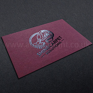 Duplexed claret and mist colorplan with gloss black foil debossing to both sides.