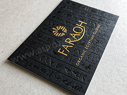 Antique gold and gloss black foil on thick black business cards.