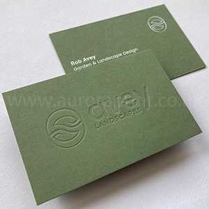 blind debossed mid green 540gsm business cards with white print.