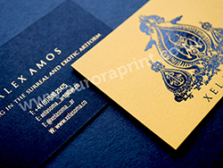 Duplexed business cards with gold and black foil.