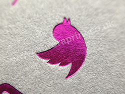 Foil printing quality - metallic purple foil on smoke grey business cards