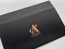 DL envelopes with rose gold foil print.