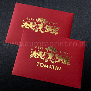 Metallic gold foil on C6 vermillion red envelopes