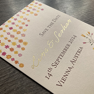 Gold foil and colour printed save the date cards.