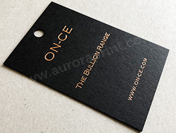 Rose gold foil printed swing tags on ebony colorplan card