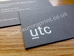 White foil business cards printed on dark grey colorplan
