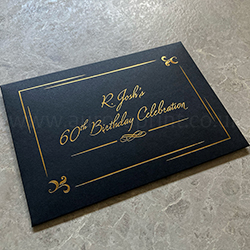 Metallic gold foil print on black C6 bespoke envelopes.