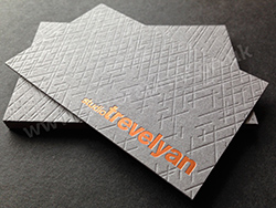 Copper foil and bespoke embossed smoke grey business cards.