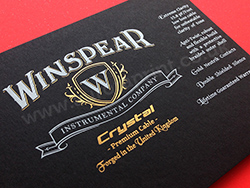 700gsm ebony cards with gold and white foil printing.