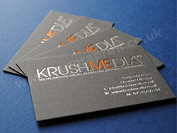 Dark grey colorplan business cards with metallic blue, silver and copper foils.