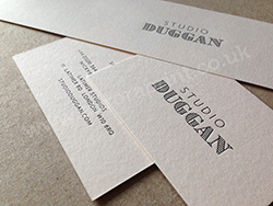 Vellum business cards printed with gloss black foil.