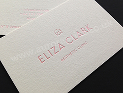 Natural colorplan business cards with pearl pink hot foil printing.