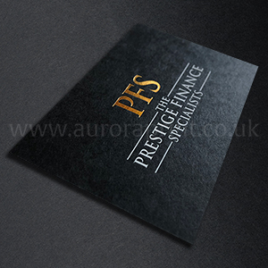Bright metallic gold and white foil printed on black business cards.