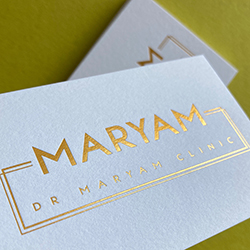 Antique gold foil printed business cards, on pristine white 540gsm colorplan