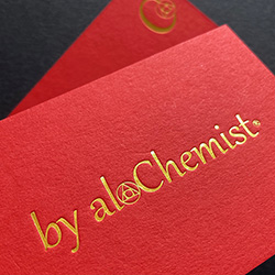 Bright red a yellow-gold foil printed business cards