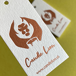 Satin copper foil printed swing tags, using 540gsm natural colorplan card. 
