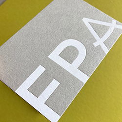 White foil printed business cards on 540gsm real grey.